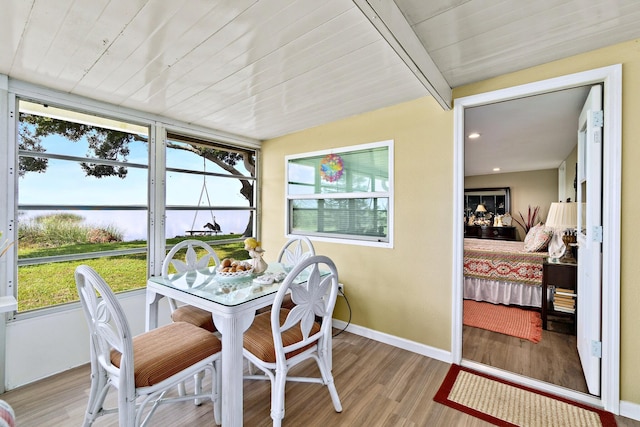 sunroom with wooden ceiling