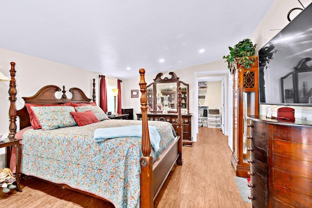 bedroom with light hardwood / wood-style floors