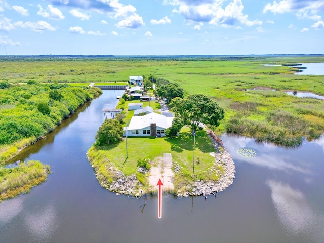 drone / aerial view with a rural view and a water view