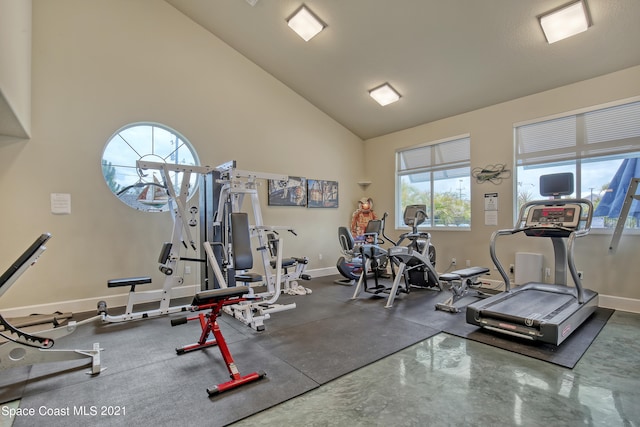 workout area with vaulted ceiling