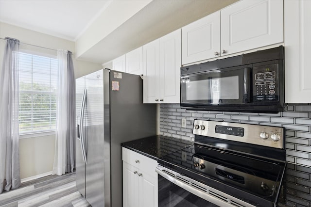 kitchen with light wood-type flooring, ornamental molding, stainless steel appliances, decorative backsplash, and white cabinets