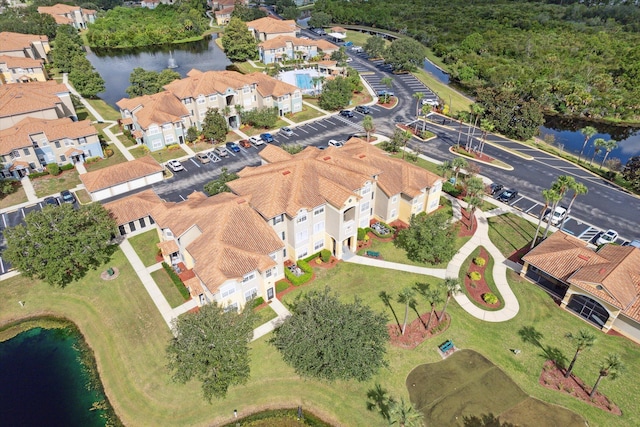 drone / aerial view with a water view