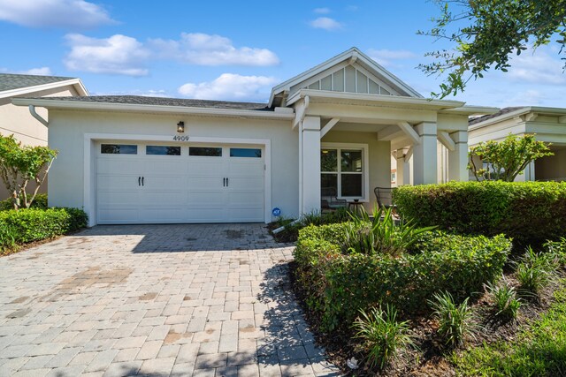 view of front of property with a garage