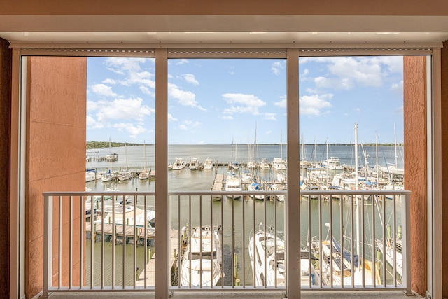 balcony featuring a water view