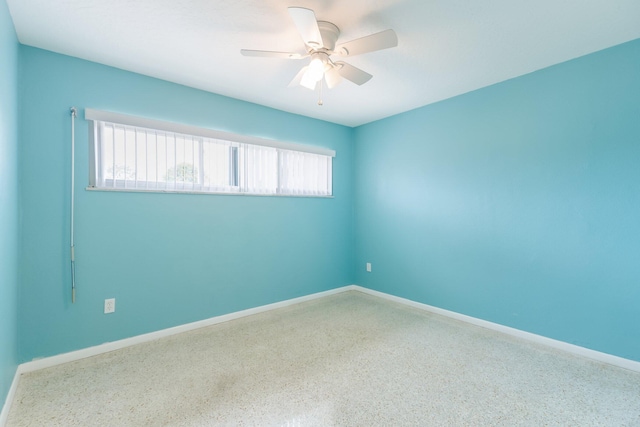 unfurnished room featuring ceiling fan