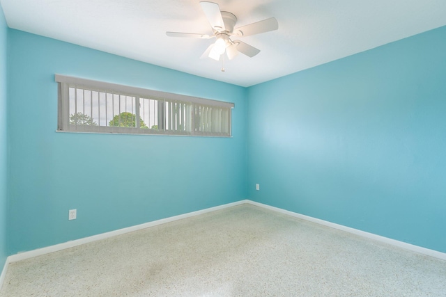 spare room featuring ceiling fan