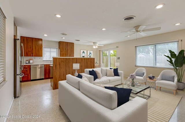 living room with ceiling fan