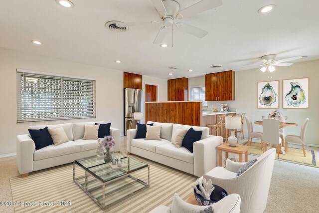 living room featuring ceiling fan