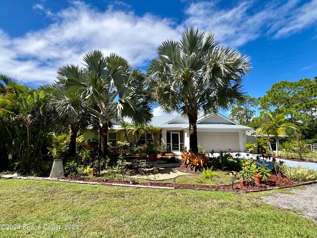 view of yard with a garage