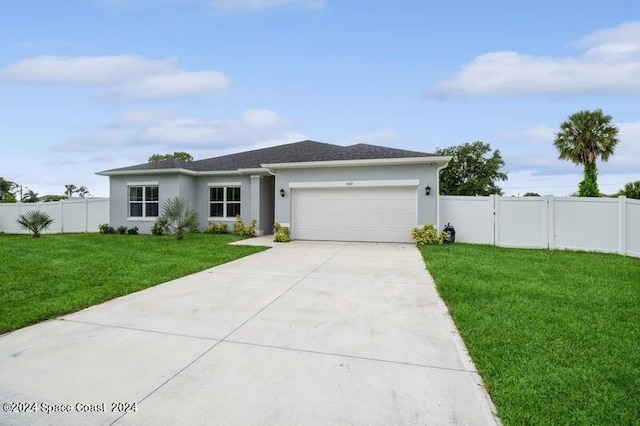 ranch-style home with stucco siding, driveway, a front lawn, fence, and an attached garage