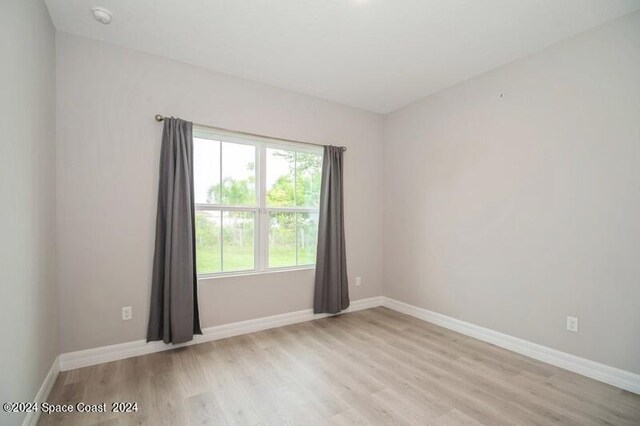 empty room featuring light hardwood / wood-style flooring