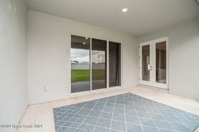 view of patio featuring french doors