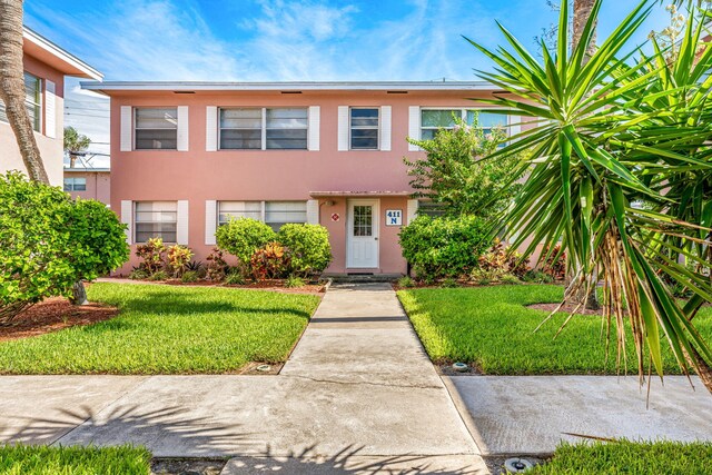 view of front of house with a front yard