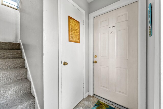 interior space featuring light tile patterned floors