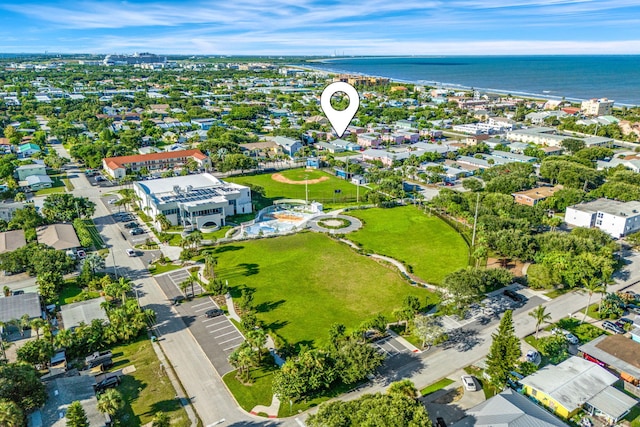 bird's eye view with a water view