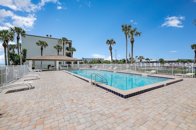 view of pool featuring a patio area