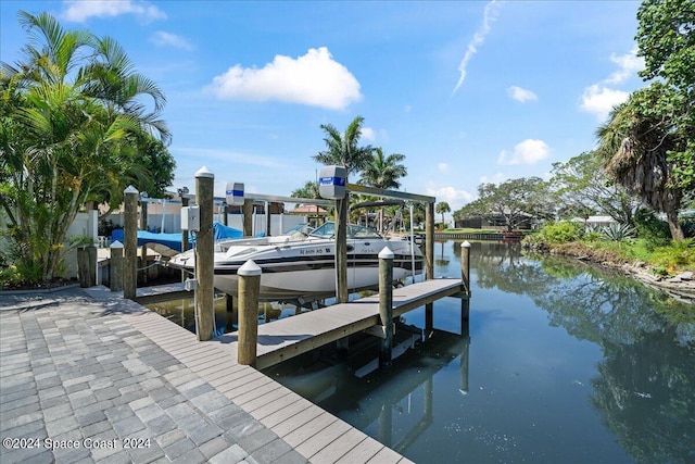 view of dock with a water view