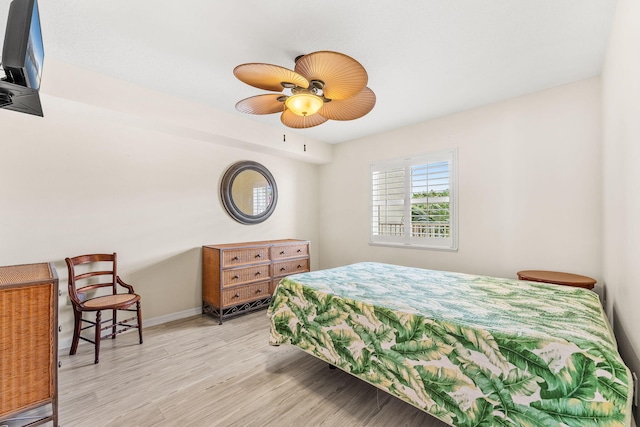 bedroom featuring ceiling fan and light hardwood / wood-style floors