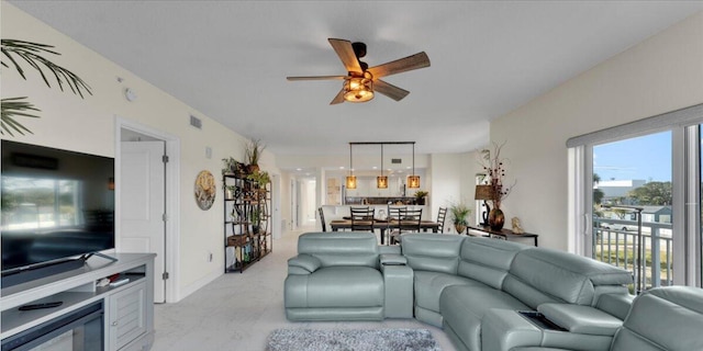 living room featuring ceiling fan