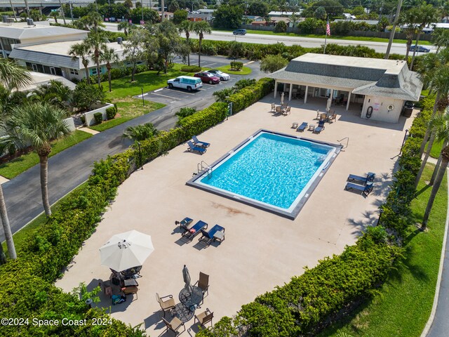 view of pool featuring a patio