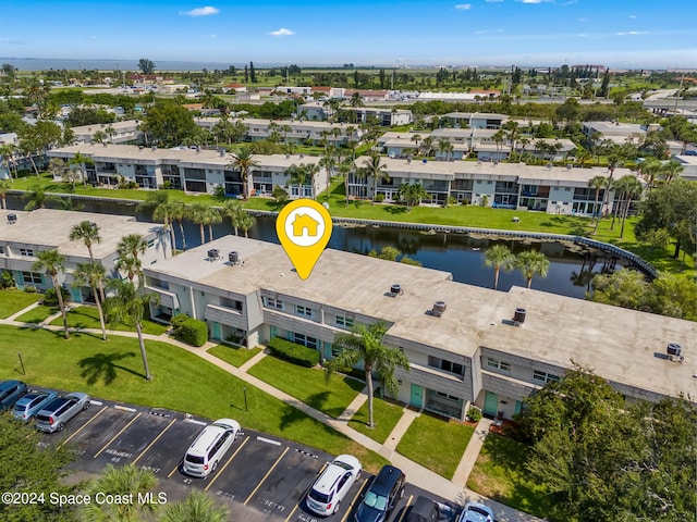 413 Blue Jay Ln Unit 413, Satellite Beach, FL 32937 - aerial perspective of suburban area with a nearby body of water