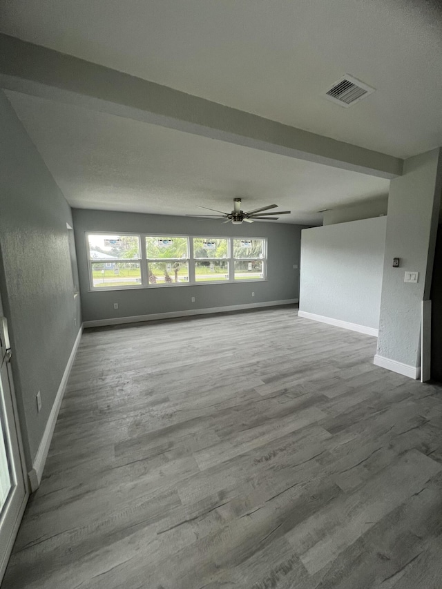 interior space featuring hardwood / wood-style flooring and ceiling fan