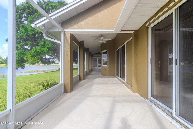 view of patio featuring ceiling fan