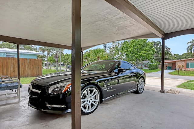 exterior space with a carport