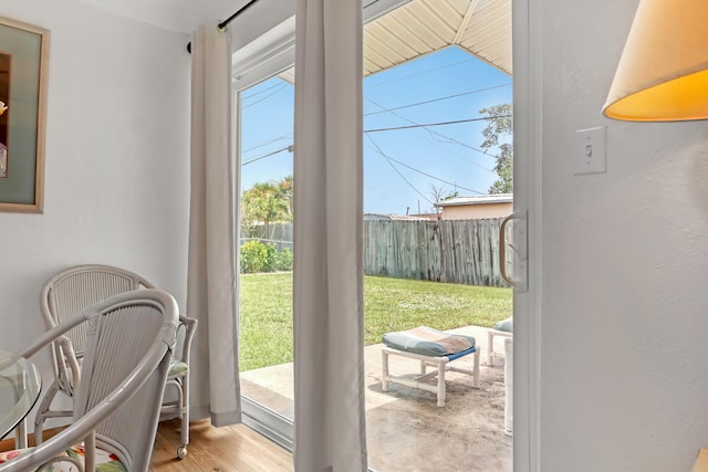 doorway to outside with light hardwood / wood-style flooring