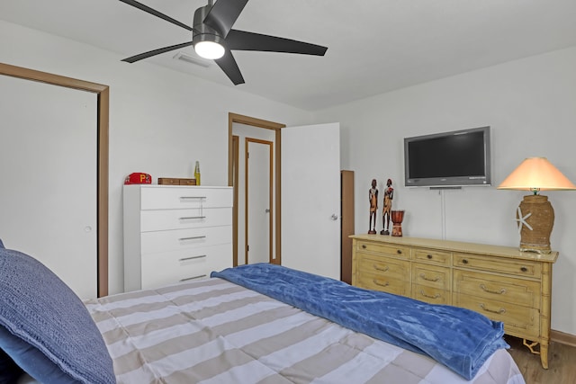 bedroom featuring ceiling fan and hardwood / wood-style floors