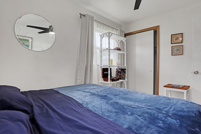 bedroom featuring a closet and ceiling fan