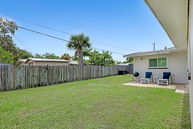 view of yard with a patio area