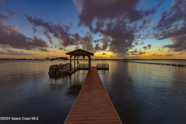 dock area featuring a water view