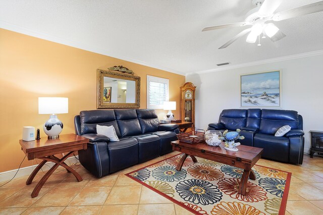 tiled living room with a textured ceiling, ornamental molding, and ceiling fan