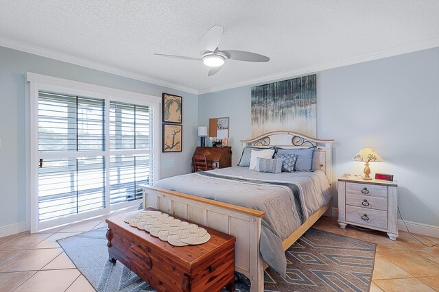 bedroom with ceiling fan, ornamental molding, a textured ceiling, and light tile patterned flooring