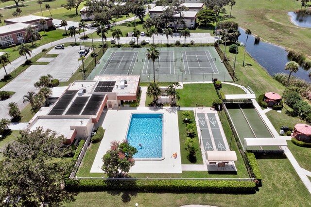 birds eye view of property featuring a water view