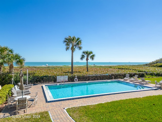 view of swimming pool featuring a patio area