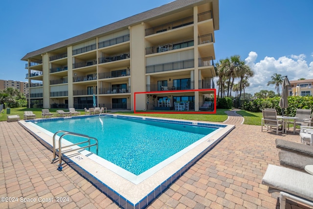 view of pool with a patio area