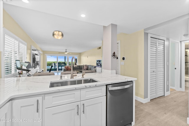 kitchen featuring ceiling fan, white cabinetry, dishwasher, light hardwood / wood-style floors, and sink