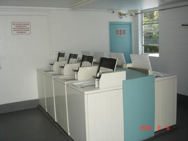 laundry room featuring separate washer and dryer