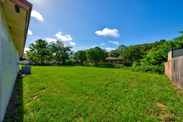 view of yard with central AC