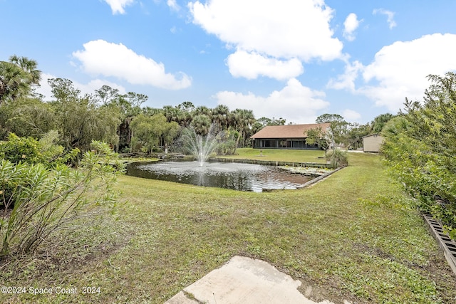 view of yard with a water view