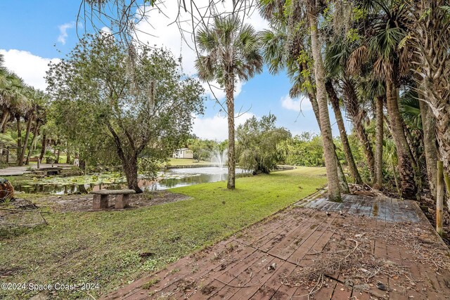 view of yard with a water view