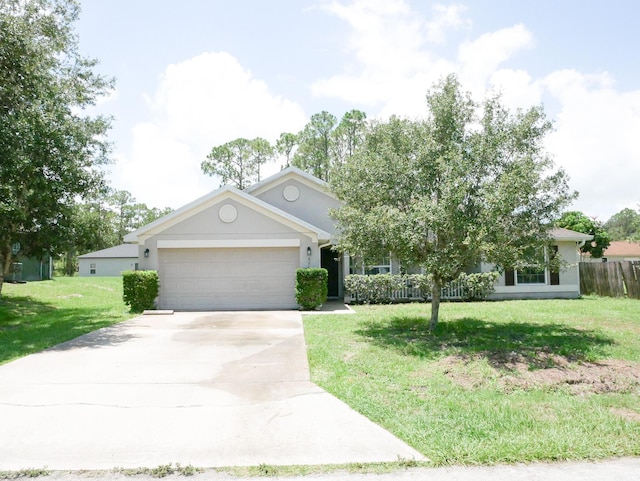 ranch-style home featuring a garage, driveway, a front lawn, and stucco siding