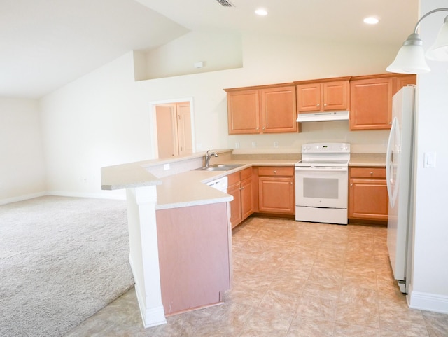 kitchen with white appliances, a peninsula, light countertops, under cabinet range hood, and a sink