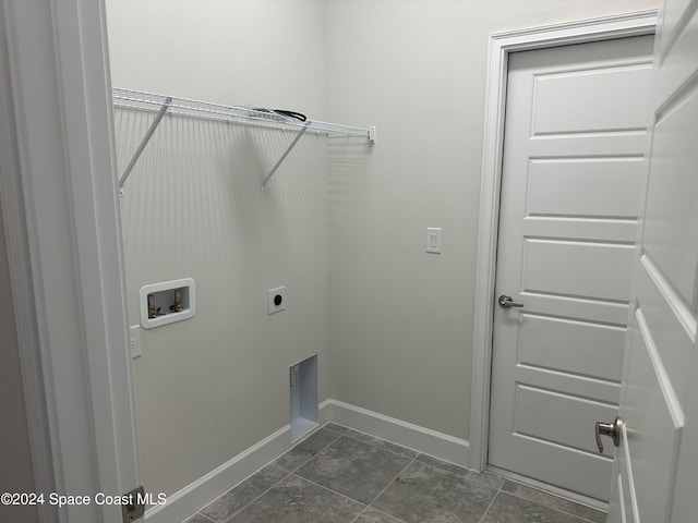 laundry area with hookup for an electric dryer and washer hookup