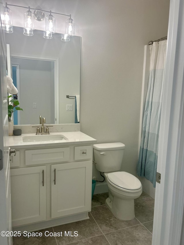 858 Soleway Dr, Palm Bay, FL 32907 - full bath with vanity, toilet, and tile patterned flooring