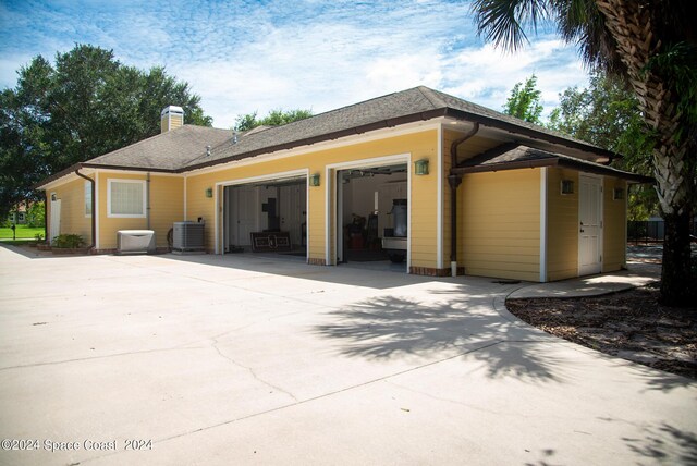 exterior space featuring central AC unit and a patio area