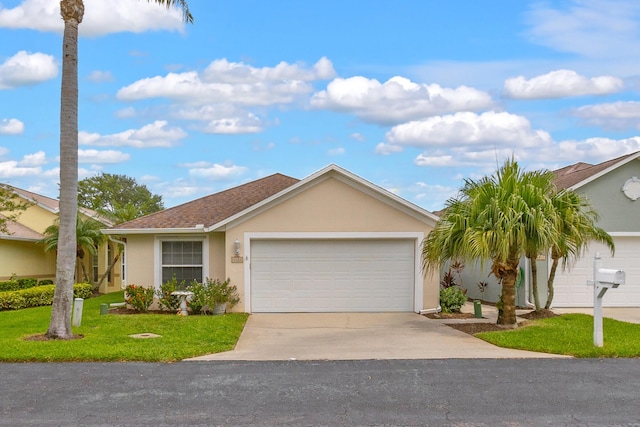 ranch-style house with a garage, a shingled roof, driveway, stucco siding, and a front lawn