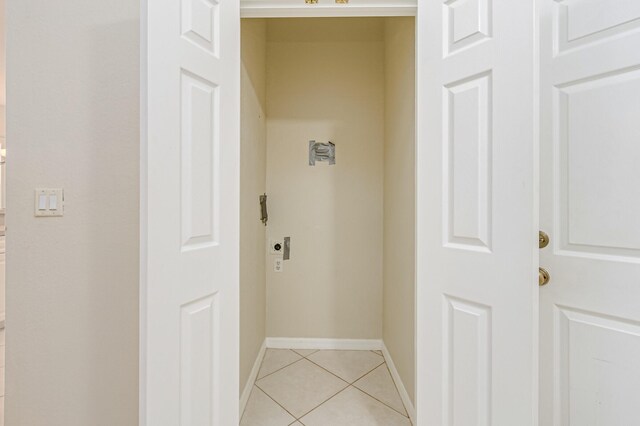 hallway with light tile patterned floors